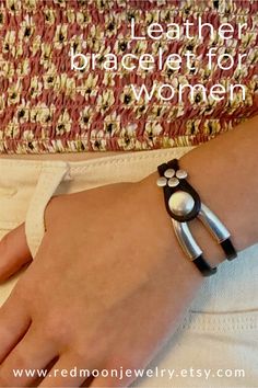 This artisan crafted black leather bracelet for women is a beautiful piece of jewelry you'll want to wear everyday! You can choose from this 4 dot slider bead or a hammered coin. Nice way to personalize your jewelry. #redmoonjewelry Handmade Wrap Bracelet Perfect As A Gift, Handmade Wrap Bracelet As Gift, Trendy Hand Wrapped Jewelry, Silver Hand Wrapped Bracelets, Bohemian Adjustable Jewelry For Mother's Day, Trendy Silver Leather Jewelry, Trendy Wrap Bracelet Gift, Elegant Silver Wrap Bracelet, Adjustable Hand Wrapped Bracelets