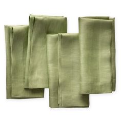 four pieces of green linen folded on top of each other