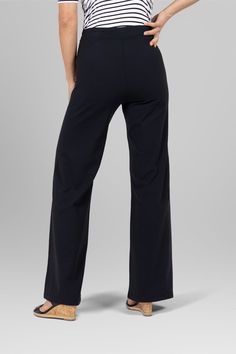 Why We Love This: Presenting our Natalie Sailor Pant —a harmonious blend of sophistication and versatility. Meticulously crafted with 4-way stretch fabric, this pull-on pant embodies effortless elegance and unparalleled comfort, elevating your style with every step. A modern twist on classic style, offering a flattering wide leg silhouette that elongates at every turn. Exude confidence and competence in our expertly designed work pants. Features: KiraGrace PowerStrong: Feels like cotton, keeps you dry High-rise, 32" inseam. Leg Opening: 23" Beautifully detailed gold button front Effortless elegant pull-on silhouette Made in USA of imported fabric Waist: High-Waisted (12" Rise) Inseam: 32" inseam, easy to hem Leg Shape: Wide leg pant Sizing: True to size Compression: Fitted through the hips Black Athleisure Bottoms With Pull-on Style, Versatile Black Pull-on Pants, Relaxed Fit Workout Pants Made Of Elastane, Relaxed Fit Elastane Workout Pants, Workout Pants Relaxed Fit In Elastane, Chic Comfort Stretch Full Length Pants, Chic Full-length Comfort Stretch Pants, Full-length Sweatpants With Elastic Waistband, Full Length Sweatpants With Elastic Waistband