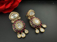 This a beautiful Premium Earring is Amrapali Designer earring with Big Uncut kundan, Moissanite kundan and Pachi kundan design with cut Cubic Zirconia around the big kundan is very Light weighted, Chic and modern. It is a statement earring with stunning designer look which makes it a must to have in your collection. This is so beautiful to look at and a perfect one for Indian weddings.  Earring Style 1: length : 1.9 inch / width : 0.9 inch / Each earring Weight : 9.5 grams  Earring Style 2: leng Kundan Design, Earring Indian, Earring Bridal, Premium Jewelry, 21 Grams, Indian Jewelry Sets, Statement Earring, Indian Earrings, Indian Weddings