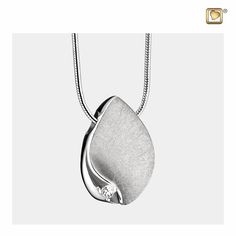 The TearDrop Pendant with rhodium plating is both beautiful and exquisite, as well as well-made and durable. The pendant itself is styled after a teardrop, but the features enhance it to give it a touch of class and refinement. The surface of the teardrop has been given a textured coating, which pairs with the striking crystal detail at the bottom of the pendant. The teardrop is made from sterling silver 925 but has been coated in rhodium plating. It is durable, resists corrosion and scratches, Modern Teardrop Necklace For Anniversary, Silver Teardrop Pendant Necklace For Formal Occasions, Modern Silver Teardrop Pendant, Elegant Silver Teardrop Drop Necklace, Elegant Silver Water Drop Earrings, Silver Teardrop Pendant Necklace With Elegant Design, Classic Silver Teardrop Pendant, Elegant Teardrop Pendant With Polished Finish, Modern Teardrop Drop Necklace For Formal Occasions