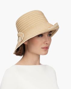 Raffia cloche hat with integrated back bow detail is romantic and chic. Brim can be worn flipped up or down; either way it brings focus to your eyes while keeping the sun off your face. The unique row on row stitched ventilated weave is unmistakeable Squishee®, lightweight and flexible, so you can roll and fold it. Because of the minuscule perforations in the textural weave, this style is not recommended for melanoma patients. Rolls and folds for packing Rated UPF 50+, Blocks over 50% of UVA/UVB Small Leather Accessories, Art Costume, Gold Sand, Women's Headwear, Costume Institute, Navy Linen, Natural Gold, Cloche Hat, Bow Detail