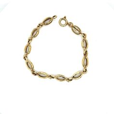 "Vintage 14k Yellow Gold Italian Made Link Bracelet. The unique gold link bracelet was made by Italian gold manufacturer Unoaerre. The bracelet measures 7 5/8\" long and 6.1mm wide. This bracelet weighs 6.00g." Vintage Gold Bracelet With Oval Link For Formal Occasions, Vintage Oval Link Gold Bracelet For Formal Occasions, Gold Diamond Bracelet With Oval Links, Antique 14k Gold Bracelets, Antique 14k Gold Bracelets In Gold, 14k Gold Charm Bracelet For Formal Occasions, Gold Link Diamond Bracelet For Formal Occasions, Gold 14k Hallmarked Chain Bracelet, Elegant Chain Link Gold Bracelet With Gold Clasp