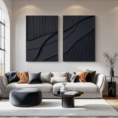 a living room with two paintings on the wall