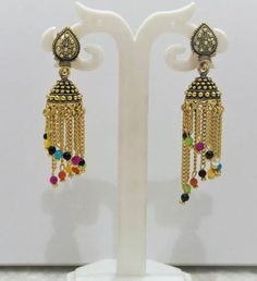 This Unique pair of Earrings is designed and crafted at PraNiCollectioNs  PraNiCollectioNs is the place for anyone who Is in lookout for a latest trend with an ethnic touch.  We at PraNiCollectioNs offers a great range of Indian Ethnic jewellery's. We are strongly committed to  providing our customers  some uniquely handcrafted products with utmost satisfaction. These jewellery's are made from high quality  material which are Hypoallergenic and are also free from corrosion and rusting This listi Temple Jewelry Chandbalis With Latkans, Temple Jewelry Style Chandbalis With Latkans, Temple Jewelry Bridal Earrings With Latkans, Temple Jewelry Style Bridal Earrings With Latkans, Navratri Latkans Jhumka Drop Earrings, Navratri Jhumkas With Latkans, Tilla Dangle Jhumkas For Festivals, Festive Metal Hoop Earrings In Temple Jewelry Style, Festive Brass Chandelier Earrings In Temple Jewelry Style