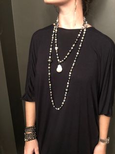 132 South Sea, Tahitian, and Akoya pearls are hand-knotted on silk. A rare “cake-pop” Baroque pearl hangs central to this necklace. Can be worn long, doubled, or three times around the neck. No clasp. 66" with 1.5" drop. South Seas, Cake Pop, Akoya Pearls, Baroque Pearls, Hand Knotted, Silk, Cake