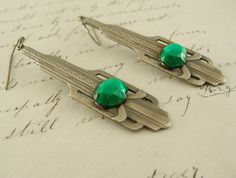 Love emerald anything. Green Art Deco Drop Earrings, Handmade Antique Plug Earrings As Gift, Art Deco Green Jewelry For Pierced Ears, Handmade Brass Art Deco Earrings, Vintage Emerald Drop Earrings, Handmade Art Nouveau Drop Earrings, Nickel-free Art Nouveau Earrings As Gift, Vintage Emerald Earrings For Gift, Vintage Emerald Earrings As Gift