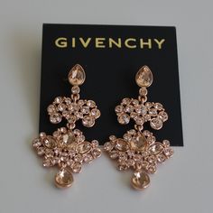 New With Tags! *Rose Goldtone Metal *Chandelier Earrings *Stone Accents *Post Back Closure *About 2.1/8" Drop Rose Gold Crystal Chandelier Earrings For Party, Glamorous Rose Gold Dangle Chandelier Earrings, Glamorous Rose Gold Chandelier Earrings, Rose Gold Dangle Chandelier Earrings For Party, Rose Gold Chandelier, Givenchy Earrings, Givenchy Jewelry, Monogram Earrings, Gray Earrings