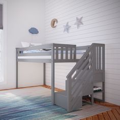 there is a bunk bed with stairs in the room