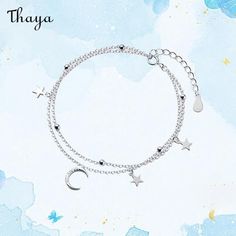 The Thaya Ladies' 925 Silver Star Necklace is a stunning piece of jewelry that is perfect for adding a touch of elegance to any outfit. Crafted from high-quality 925 silver, this necklace is both durable and long-lasting. The diamond inlay process adds an extra layer of sparkle and shine to the star-shaped pendant, making it a real showstopper. Perfect as a gift for a loved one or as a special treat for yourself, this necklace is sure to become a cherished item in your jewelry collection. Elegant Silver Jewelry With Star Charm, Sterling Silver Star Jewelry In Silver, Sterling Silver Star Shaped Jewelry In Silver, Elegant Sterling Silver Star Charm Jewelry, Silver Dangle Jewelry With Moon Charm, Silver Star-shaped Dainty Jewelry, Elegant Sterling Silver Necklaces With Star Charm, Elegant Silver Necklace With Star Charm, Silver Necklace With Star Charm And Adjustable Fit