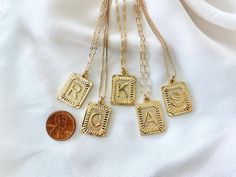 **Each piece in my shop, I personally create and photograph. (All photos are property of The Cord Gallery LLC) Thank you for supporting my small business. These stunning Initial Necklaces add a vintage and modern touch to anything you wear them with! Features a 24k gold plated square Medallion Letter Pendant with lots of texture, interest and sheen. This look is timeless and at the same time, very on-trend right now! **Pendants are 1 inch tall (including connector) by .75 inch wide. Chain length Letter Charm Necklace, M Necklace, Initial Necklaces, Gold Letter Necklace, Letter Pendant Necklace, Gold Medallion, Initial Necklace Gold, Letter Charm, Initial Pendant Necklace