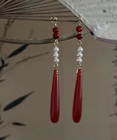 Retro Red Alloy Acrylic Pearl Agate Drop EarringsMade of fine Alloy Acrylic Pearl Agate.Measurement: 7.2cm/2.808" * 0.7cm/0.273". Matches easily with daily hairstyle, dresses & Shirts Red Agate Earrings With Natural Stones, Red Agate Earrings For Gift, Red Agate Earrings As Gift, Red Agate Dangle Earrings, Red Carnelian Earrings, Red Carnelian Earrings With Ear Wire, Red Carnelian Teardrop Jewelry, Red Carnelian Pierced Earrings, Red Carnelian Teardrop Earrings