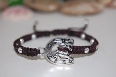 "Horse Bracelet,Horseshoe Bracelet,Macrame Bracelet,Horse Gifts,Man,Woman,Horse Lovers Bracelet,Horse Jewelry,Good Luck Bracelet,Gift The bracelet in the picture shown is 7\" size which fits an average wrist, please select your size from the drop down menu at checkout I will custom make your order, if any questions or idea please feel free to contact message me anytime, thank you for visiting. * * * * * * * * * * * * * * * * * * * * * * * * * * * * * * * * * * CHOOSING SIZE: Sizes are actual wri Equestrian Bracelet, Purple Crystal Bracelet, Mens Choker Necklace, Horseshoe Bracelet, Horse Bracelet, Bracelet Macrame, Lovers Bracelet, Good Luck Bracelet, Handmade Jewelry Bracelets