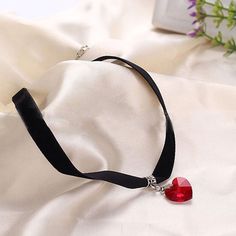 Gothic Women Fashion Jewelry Teen Girl Gift Idea, bridesmaid girl, flower girl, party jewelry, Valentine's necklace Cord Material: Black Velvet Length: 31cm plus 5cm (extension) Charm: Heart shape Crystal in 6 different colors Visit our shop to check out other unique items: https://www.etsy.com/shop/SecretBelladonna Heart-shaped Rhinestone Necklace As Gift, Heart-shaped Rhinestone Necklace For Gift, Heart Pendant Jewelry For Mother's Day Party, Party Heart Choker Necklace With Clavicle Chain, Valentine's Day Heart Necklace With Clavicle Chain For Parties, Elegant Heart Choker As Gift, Elegant Heart Shaped Choker Gift, Elegant Heart-shaped Choker Gift, Elegant Heart-shaped Choker For Gift