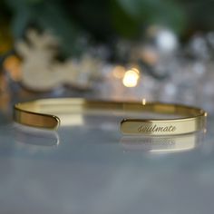 Treat your loved ones with our range of jewellery with meaning - engraved bracelets, necklaces, keychains.  - 22K Gold plated bracelet engraved with your chosen message. - The  thickness of gold plating is around 0.5 microns (it's sufficient even for jewelry pieces that are exposed to rough wear) - Text, coordinates, numbers or handwriting outside and inside the cuff  - Up to 90 characters  on each side - Approximately 5mm wide, 16cm long - The perfect gift for special occasions like Mother's Da Engraved Name Bracelet For Personalized Gift, Classic Name Bracelet As A Gift, Classic Name Bracelet For Mother's Day Gift, Personalized Meaningful Name Bracelet Gift, Personalized Name Bracelet For Gift, Personalized Name Bracelet For Gifts, Engraved Nameplate Bracelet As Gift, Engraved Name Bangle Bracelet As Gift, Engraved Nameplate Charm Bracelet For Gift