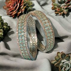 "Hey, Welcome to our shop! Indian Bollywood American Diamond Wedding Blue Bridal sabyasachi Inspired Bangle Set / CZ Stone Jewelry/ Fashion Women And Girl/ Engagement Jewellery/Pakistani Jewelry for Women/Silver Finish Bridal Bracelet Indian Jewelry Cubic Zirconia Bangles/ Rhodium Plated Bangle  < 1 DAY ITEM SHIPMENT | 7-8 Days Delivery TIME> About our Jewellery - Classic, Brilliant & Elegant. We deal in all type of Premium Indian Bollywood Jewellery. * AD Jewelry set * Kundan Necklace * Polki Jewellery * Uncut Jewellery * AD Ring * AD Bangles * AD Pendant Set * Pachi Kundan & many more.. * All our products are made with high-quality stones, the intricate texture and design makes it a must-have for every modern woman. 100% Brand New & 100% High Quality All jewelry Sets & Other Product Mate Bollywood Style Bangle For Diwali Wedding, Bollywood Bangle For Wedding And Diwali, Bollywood Style Wedding Bangle For Diwali, Silver Kundan Bracelet With Cutdana, Silver Kundan Bracelets For Diwali, Silver Chandbali Bracelets With Meenakari, Traditional American Diamond Bangle For Festive Occasions, Silver Chandbali Bangle For Diwali, Hand Set Bangle For Wedding And Diwali