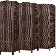 four tall brown woven room dividers