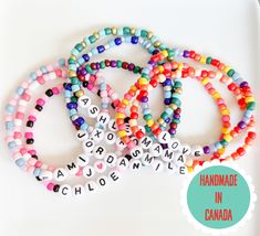 Make your own fun and colourful custom word or name bracelet! Perfect for stacking or layering with other bracelets. These also make a great gift for a best friend, bridesmaids, mom, or your kiddos! Bracelet features 4mm glass seed beads and acrylic white letter beads strung on stretchy elastic cord. Choose from many different colours or create your own custom bracelet (see different pattern ideas in photos.) You can also customize the bracelet with coloured hearts. (See options in photos.) This Bracelets Kids, Beaded Name Bracelet, Essential Jewelry, Aromatherapy Jewelry, Word Bracelet, Stacking Bracelets, Letters For Kids, Custom Bracelet, A Best Friend