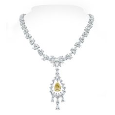 With a yellow pear shape diamond at its center, the Amaya necklace is all about delicacy and oomph. The marquise and pear diamonds weaving around the neck are elegant and sensual. This stunning piece can be worn with or without the pendant to add to its versatility and allure. Diamonds Shapes: Pear Shape, Marquise, Emerald & Round Center Solitaire: 2.60 ct Fancy Yellow Pear ShapeTotal Diamonds Weight: 22.45 ctDiamonds Color: G - H Diamonds Clarity: VS - SI (Very Slightly Included - Slightly Incl Marquise Diamond Pendant, Marquise Diamond Necklace, Yellow Diamond Jewelry, Yellow Diamond Necklace, Bridal Diamond Necklace, Diamond Weave, Diamond Jewelry Designs, Expensive Jewelry, Fancy Jewelry