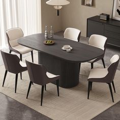 a dining room table with chairs around it