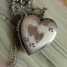 Excellent Vintage Sterling Silver Double Heart Locket 3/4" Necklace 18" 3.8 Grams All My Items Listed Come From My Personal Collection. Downsizing For Space Holidays Are Fast Approaching! No Rips, Stains, Holes On Other Items. Have Questions Please Ask. In Order To Preserve The Original Vintage/Antique Integrity Of My Items, I Do Not Polish Them. Most Items Can Be Polished By A Professional Jeweler In Order To Achieve A Brilliant Shine, But Many Customers Prefer The Original Luster Of An Unpolis Nickel-free Heart Necklace For Anniversary, Nickel-free Locket Necklace For Anniversary On Valentine's Day, Heart-shaped Locket Necklace For Mom For Valentine's Day, Heart Locket Necklace For Mom On Valentine's Day, Heart Locket Necklace Gift For Mom On Valentine's Day, Valentine's Day Heart Locket Necklace With Hallmark, Valentine's Day Heart Shaped Locket Necklace With Hallmark, Nickel-free Double Heart Necklace For Anniversary, Nickel-free Heart Locket Necklace For Anniversary