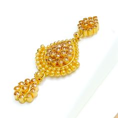 This Graceful Drop 22k Gold Kundan Necklace Set, weighing 51.8 grams, is a stunning fusion of traditional craftsmanship and elegance. Adorned with exquisite Kundan stones, it features a luxurious yellow gold finish. The set has a necklace length of 16 inches, with a drop length of 1.75 inches, and 1.7-inch adjustable links for a customizable fit. A secure hook lock ensures comfortable wear. Matching earrings, each 1.75 inches in length with screw-back posts, complete the set. Ideal for those who 22k Gold Pendant Jewelry For Diwali, 22k Gold Temple Jewelry Round Pendant, Gold Meenakari Round Pendant Jewelry, Festive Yellow Gold Pendant Jewelry, Yellow Gold Chandbali Temple Necklace As Gift, Festive Gold Round Pendant Jewelry, Yellow Gold Pendant Temple Necklace For Festive Occasions, Yellow Gold Round Temple Necklace With Meenakari, Traditional Yellow Gold Temple Necklace With Pendant