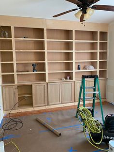 the room is being remodeled and ready to be used as a bookcase for books