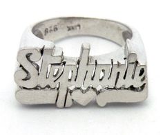 Let the world know who you are with this personalized name ring.  Written out in old school cursive with the tail of the last letter turning back to underline it all.  This ring has been handcrafted so the letters stand out in three dimensions.  This listing is for the name STEPHANIE.  Dimensions: size: 6 letters with underlining: 3/8" high x 7/8" wide (1 x 2.2 cm) band at bottom: 1/8" (3mm)  Please refer to my shop policies for shipping information.  I insure all items over $100.  I have several name rings currently available in my shop.  If you would like your own and your name is not represented, please send me a convo and I'll be happy to create one for you. Vintage Personalized Jewelry For Promise, Signature Silver Jewelry With Names, Promise Sterling Silver Ring With Engraved Text, Sterling Silver Promise Ring With Engraved Text, Promise Sterling Silver Engraved Ring, Silver Open Ring With Custom Name, Adjustable Engraved Ring With Polished Finish, Unique Sterling Silver Engraved Ring For Anniversary, Sterling Silver Rings With Names For Anniversary