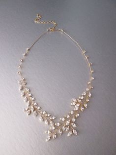 "This sparkly fun necklace is hand made using the Premium Quality European Crystal and comes in gold or silver finish. The necklace measures 22\" long and 1\" wide with the 6\" long extender. - This listing is for the necklace only  - If you would like to purchase the matching earrings please take a look here: https://www.etsy.com/listing/203769737/bridal-crystal-earrings-sparkly-crystal?ref=shop_home_active_1 * Special thanks to beautiful Erin and Jan Bon Jr. Photography for the last two photos Crystal Bridal Earrings, Sparkly Earrings, Look Here, Special Thanks, Cool Necklaces, Bridal Necklace, Rhinestone Necklace, Wedding Necklace, Necklace Gold