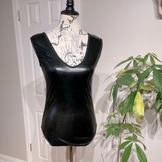 Nwot Faux Leather Vintage Y2k Glossy Shiny Wet Keyhole Bodysuit Monokini One Piece Top Blouse Rave Punk Rockstar Club Nigh Tout Whimsygoth No Tag With Size, Brand Or Fabric Sz S/M Mannequin Is Sz S For Your Reference Edgy Stretch Bodysuit For Club, Black Fitted Rave Bodysuit, Black Stretch Bodysuit For Costume Party, Edgy Black Bodysuit For Club, Edgy Fitted Bodysuit For Club, Black Rave Bodysuit For Parties, Edgy Sleeveless Party Bodysuit, Edgy Sleeveless Bodysuit For Party, Black Fitted Edgy Bodysuit