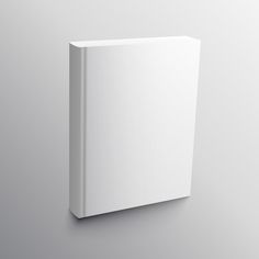 a white square object is mounted on the side of a gray wall and it appears to be empty