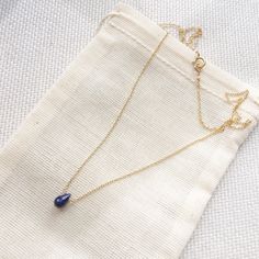 This genuine tiny teardrop sapphire sits on a simple, dainty cable chain. This simple necklace is perfect for everyday wear and is the perfect piece for layering necklaces. Sapphire is the September birthstone. If you need your order by a certain date, it is very important to send us a message on Etsy directly after you place your order, as well as write it in the 'Notes to Seller' at checkout. For more information, please refer to our FAQ page. Jewelry is handmade by us in NYC focusing on quali Gold Sapphire Necklace, Sapphire Necklace Gold, September Birthstone Necklace, Blue Sapphire Jewelry, Blue Sapphire Necklace, Gold Necklace Simple, Dainty Gold Necklace, Rose Gold Chain, Everyday Necklace