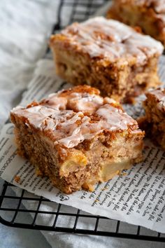 several pieces of cake sitting on top of a piece of paper