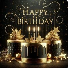 a birthday cake with lit candles and stars on it is surrounded by golden decorations,