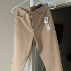 Size 6. Never Worn Great Condition. Tan Slacks/Pants Spring Non-stretch Chinos For Workwear, Non-stretch Spring Chinos For Workwear, Spring Workwear Non-stretch Chinos, Non-stretch Workwear Chinos, High Waist Fitted Chinos For Workwear, High-waisted Fitted Chinos For Work, Fitted High Waist Chinos For Work, Slacks Pants, Slack Pants