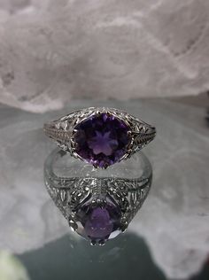 Excited to share the latest addition to my #etsy shop: 2ct Simulated Amethyst Art Deco Floral Sterling Silver Floral Filigree Ring Size (Made To Order) (Design #159) https://etsy.me/2WnMQjm #jewelry #ring #silver #no #whitegold #yes #girls #purple #amethyst Art Deco Floral, Filigree Ring, Solitaire Ring, Heart Ring, Ring Size, Amethyst, Art Deco, White Gold, Sterling Silver