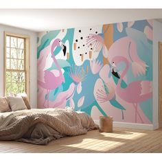 a bedroom with pink flamingos painted on the wall and wood flooring, in front of a large window