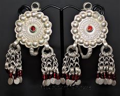 Old Afghan Silver Earrings with Red Glass Jewels.  These earrings are a rare masterpiece made with high quality silver. They are rare unique collectors pieces and can be worn as well, if you love extravagante and eccentric ethnic statement jewelry and if you can stand the weight. These earrings also habe loops at the top, so you can sew them to a turban or other headdress. One of the earrings has a matte spot on the top right, please have a close look at the pictures.  Lenth 6,5 cm / 2,56 ", Dia Kuchi Jewelry, Silver Bells, Earrings Unique, Jewelry Earrings Hoops, Red Glass, Headdress, Statement Jewelry, Silver Earrings, Etsy Accessories