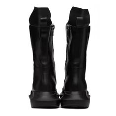 Command attention with these gothic-inspired mid-calf boots, featuring a thick platform and crafted from genuine leather. With a round-toe shape, these boots merge rugged aesthetics with unparalleled comfort. The synthetic leather insole adds durability, while the secure zip closure ensures a perfect fit. Handmade for perfection, these boots are an essential piece for a stylish look. Leather Moto, Calf Boots, Mid Calf Boots, Synthetic Leather, Mid Calf, Black Boots, Genuine Leather, Perfect Fit, Boots