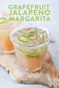 grapefruit jalapeno margarita with lime garnish on the rim