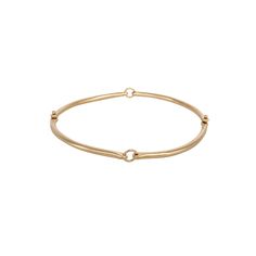 Hilary's classic bangle bracelet looks great with every outfit, and layers well with your bracelet stack. The perfect day-to-night bangle with a slinky movement that provides for ultra comfort. An essential in every jewelry collection. Choose from 14k or 18k gold. 2 1/2 inch diameter typically, but can be customized to fit. Rivet and Ring bangle can be customized with gold and silver links upon request. Made to order and will ship in 3-4 weeks. Chic Stackable Bangle For Everyday Wear, Chic Stackable Bangles For Everyday, Dainty Everyday Luxury Bangle Bracelets, Chic Everyday Stackable Bangle, Everyday Luxury Dainty Bangle Bracelet, Elegant Yellow Gold Bangle For Everyday, Everyday Minimalist Flexible Gold Bracelet, Elegant Bangle Bracelet With Spring Ring Clasp, Modern Stackable Bangle Bracelets