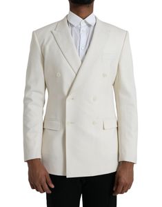 This Dolce & Gabbana blazer features a double-breasted design with two buttons. It comes in white with Martini style and slim fit. Made in Italy from 98% virgin wool and 2% elastane, it has a 100% silk lining and one open vent in the back. It also includes inside pockets and a two button closure. Mens Double Breasted Blazer, Blazer Casual, Style Blazer, Sports Blazer, Boot Pumps, Dolce And Gabbana Man, Breasted Blazer, Double Breasted Blazer, Blazer Buttons