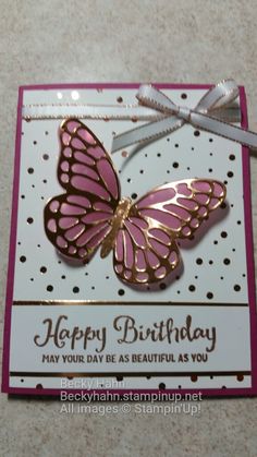 a birthday card with a pink butterfly on it