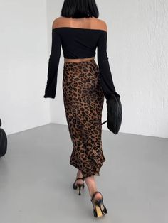 Fitted Long Skirt In Leopard Print, High Waist Leopard Print Skirt For Fall, Trendy High Waist Leopard Print Skirt, Elegant Leopard Print Summer Bottoms, Casual Leopard Print Midi Skirt Bottoms, Chic Leopard Print Midi Skirt, Chic Leopard Print Skirt For Spring, Leopard Print Skirt For Fall Party, Casual Leopard Print Midi Skirt