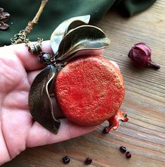 "This necklace already sold but I can make very similar (not 100% same) for your order. If you need longer chain please write it in comment to order) Statement juicy pomegranate pendant with leaves. Pomegranate seeds - natural garnet. skin and leaves - polymer clay. the bead at the top of the pendant is garnet. Garnet pomegranate ) Garnet - January birthstone Diameter of pomegranate 5cm (1.96\") Chain 48cm (19\")" Red Nature-inspired Jewelry For Gifts, Handmade Red Nature-inspired Necklace, Nature-inspired Gemstone Necklace For Gifts, Handmade Garnet Pendant Necklace, Nature-inspired Gemstone Necklace For Gift, Artisan Red Necklace For Gift, Garnet Pendant Necklace For Gifting, Garnet Pendant Necklace Gift, Garnet Pendant Necklace For Gift