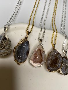 How stunning are these beauties?!! Beautiful, electroplated, tarnish resistant pendants, crafted from raw natural Druzy Agate geodes✨ Druzy Agate primarily connects with the Crown Chakra, it also has positive effects on the Throat Chakra and Third Eye Chakra. Druzy Agate is primarily associated with peace, love, intuition, stress-relief, promotes self worth and inner strength. It is a stone that brings balance and a sense of soothing. Many people associate Druzy Agate with the hidden gems inside us that we often hide under a polished exterior. Some of properties of Druzy Agate are: * Inner harmony * Harmonious relationships with others * Creativity * Relaxation * Self-love * Self-worth * Balance All orders are presented in a organza bag with quality freebies ✨ 💎Jewellery Care💎 To ensure Gold Crystal Necklaces With Agate Stones, Gold Agate Crystal Necklaces With Stones, Gold Agate Crystal Necklace With Stones, Agate Crystal Pendant Necklace As Gift, Agate Raw Stone Jewelry For Jewelry Making, Agate Necklace With Raw Stone For Gift, Teardrop Agate Necklace With Large Stone, Agate Freeform Necklace For Gifting, Raw Stone Agate Jewelry Gift