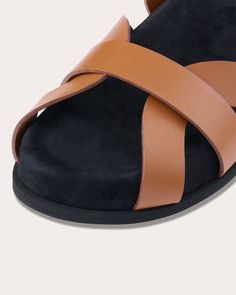 Blending luxury with laid-back appeal, the Ibor sandal encircles the foot with a series of wide leather straps to create an eclectic effect. The thick platform sole and suede insole lining offer elevated comfort. Slip-on Rounded toe Upper: 100% calf leather Lining: 100% goat leather Insole: 100% suede Outsole: 100% micro Spot clean Made in Italy Size & Fit Platform height: 1.37in (35mm) Fits true to size Sustainability Metrics: Circular Economy: product is intentionally designed with 50% of actively cycled materials Organic Materials: at least 60% of materials used for production come from natural sources and do not contain harmful toxins or waste Craft & Community: at least 75% of products are fully sourced and manufactured within the specified community or country; 100% of production adh Circular Economy, Goat Leather, Flat Sandals, Leather Sandals, Calf Leather, Leather Straps, Caramel, Slip On, Sandals