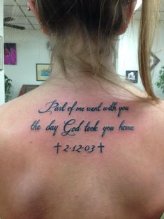 the back of a woman's neck with a tattoo saying, part of me went with you