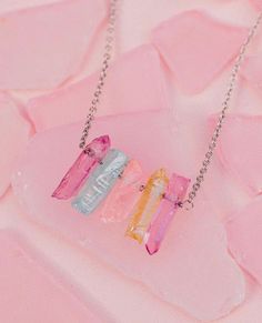 Wanna instantly brighten up any outfit? Then toss on our Rainbow Crystal Necklace! Set on a classic silver chain, this style features five quartz chips in a variety of pastel hues. Pair it with our other gemstone designs to get in on the crystal craze. - Brass base with rhodium plating & dyed quartz- Chain: 16" with 2" extention- Total length of quartz section: 1"- Because jewelry products are handcrafted by artisans, dimensions may vary from piece to piece Founded in Costa Rica, Pura Vida Brace Costa Rica Pura Vida, Quartz Choker, Pura Vida Bracelets, Rainbow Quartz, Pinky Promise, Rainbow Crystal, Pastel Hues, Quartz Ring, Necklace Silver