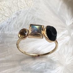 Top of the world~~~~~~~~~~~~~~~~~~~~~~~~~This is a pretty 14K gold filled mothers ring. The band is set with three birthstones, in three sizes, Oval, square and round by choice or with the stones on the picture Onyx, labradorite and citrine. (R2613)For more info about gold filled please check our profile.Construction & Dimensions:~~~~~~~~~~~~~~~~~~~~~~~14K yellow gold filled, Onyx, labradorite and citrine.Approximate band width: 2.5mm please indicate your requested size in the order.About our je Gold Ring With Gemstone Accents, Modern Multi-stone Birthstone Ring For Promise, Unique Multi-stone Opal Ring In Gold, Unique Gold Opal Ring With Multi-stone, 14k Gold Moonstone Ring With Gemstone Accents, Gold Cluster Ring With Gemstone Accents, Gold Moonstone Ring With Gemstone Accents For Anniversary, Gold Moonstone Ring With Gemstone Accents, Gold Stackable Opal Promise Ring